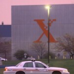 Xerox security officers patrol the Webster plant grounds after the company released a statement about third-quarter earnings and a general recovery plan. Oct. 24, 2000