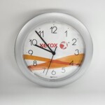 Wall mounted clock with Xerox logo